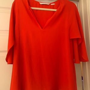 Orange v-neck blouse